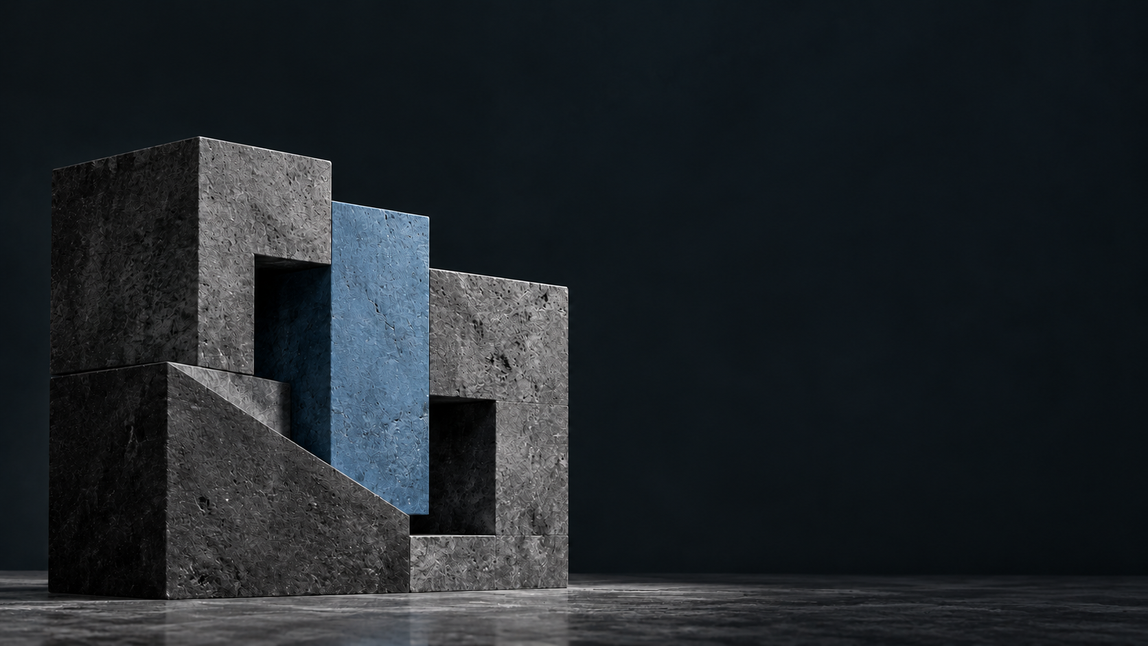 Stone and blue blocks on a dark surface
